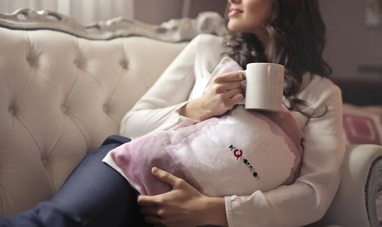 Guide Complet sur les Pompes à Chaleur à Montauban et ses Alentours 1 Woman in White Long-sleeved Shirt Holding White Ceramic Mug